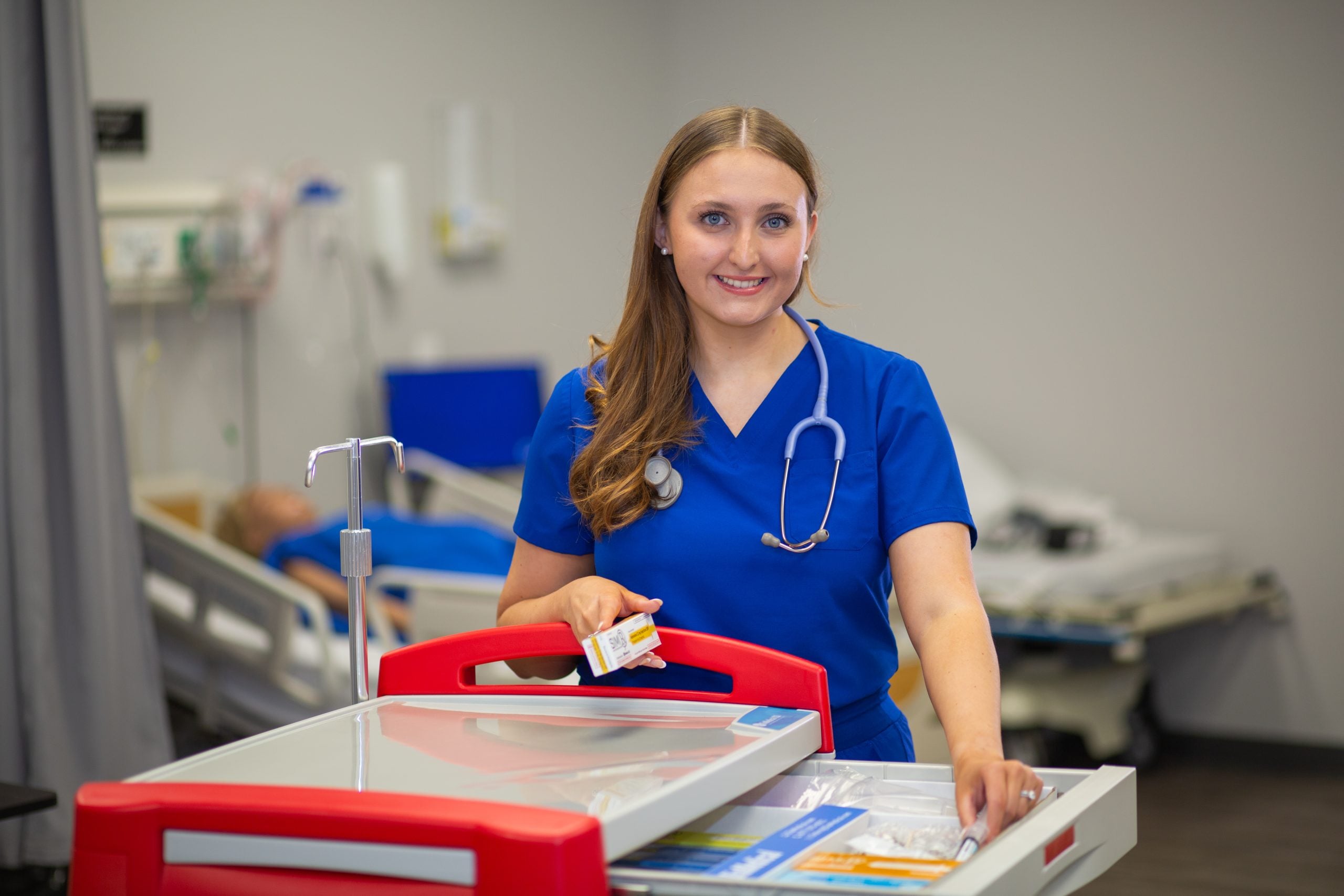 nursing student in lab posing